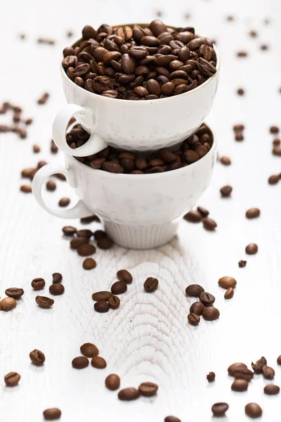 Taza y granos de café — Foto de Stock