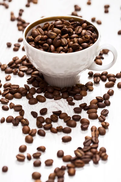 Cup and coffee beans — Stock Photo, Image