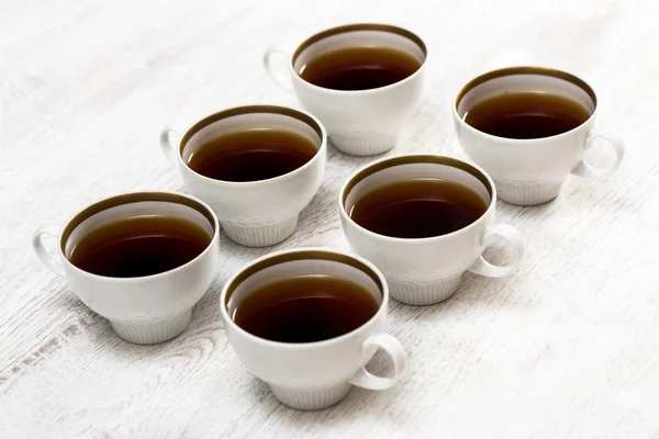 Cups met thee of koffie — Stockfoto