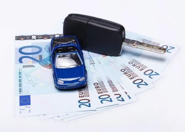 Automobile giocattolo e banconote in euro — Foto Stock