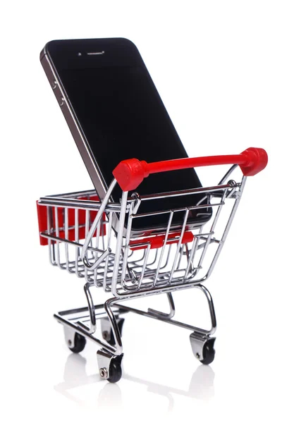 Smartphone in shopping trolley — Stock Photo, Image