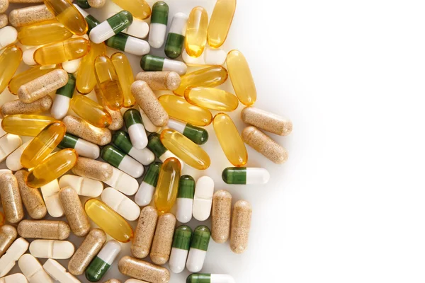 Diferentes pílulas coloridas — Fotografia de Stock