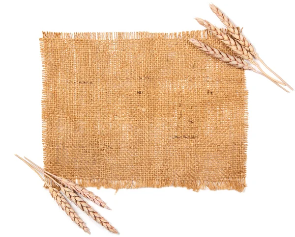 Sackcloth and wheat — Stock Photo, Image