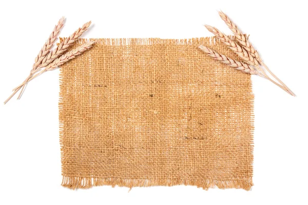 Sackcloth and wheat — Stock Photo, Image