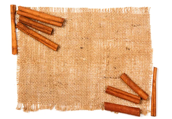 Cinnamon on sackcloth — Stock Photo, Image