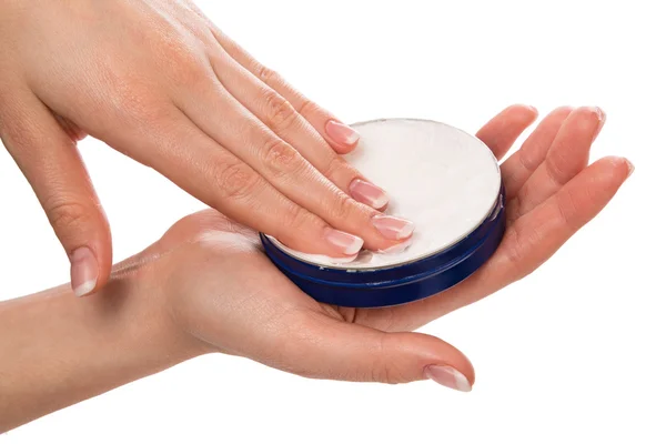 Woman applying moisturizer cream on hands — Stock Photo, Image