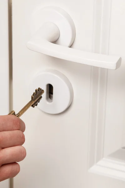 Hand with key — Stock Photo, Image