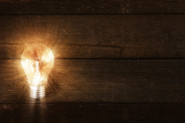 Glowing lightbulb — Stock Photo, Image