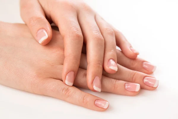 Hands with french manicure — Stock Photo, Image