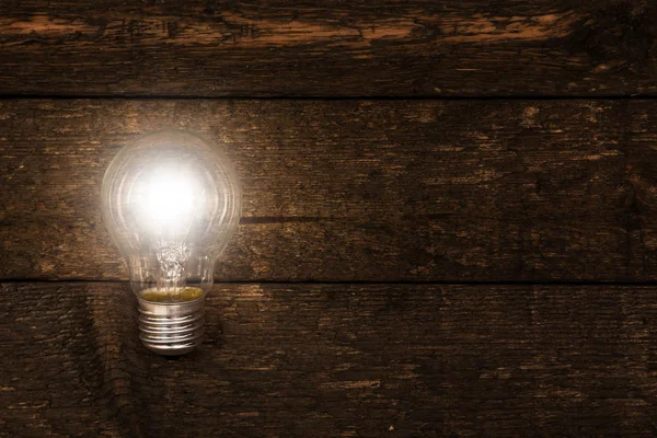 Glowing lightbulb — Stock Photo, Image