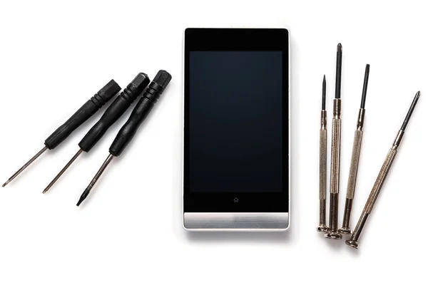Smartphone and  screwdrivers — Stock Photo, Image