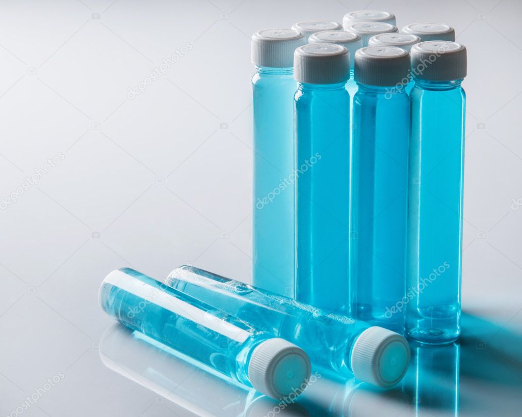 Bottles with blue liquid