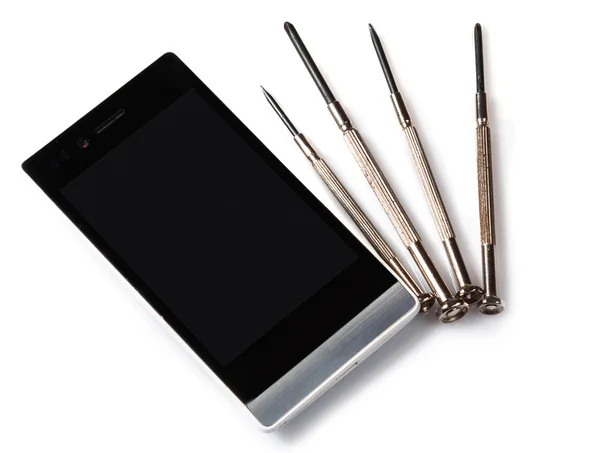 Smartphone and  screwdrivers — Stock Photo, Image