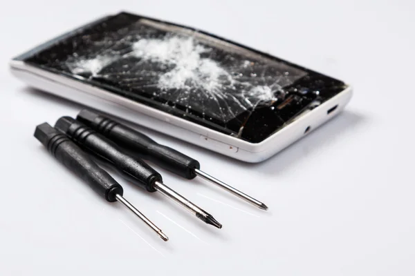 Smartphone with cracked display — Stock Photo, Image