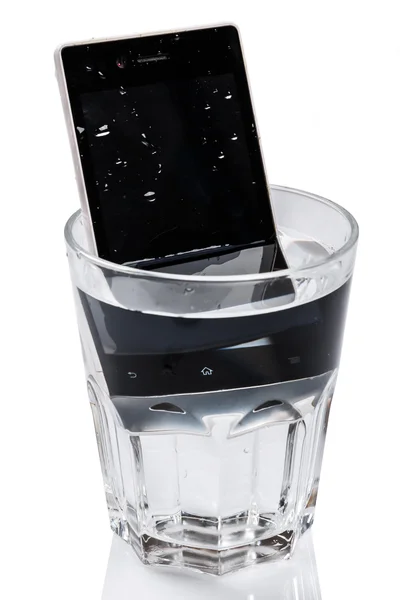 Smartphone in glass with water — Stock Photo, Image