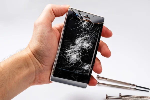 Smartphone with cracked display — Stock Photo, Image