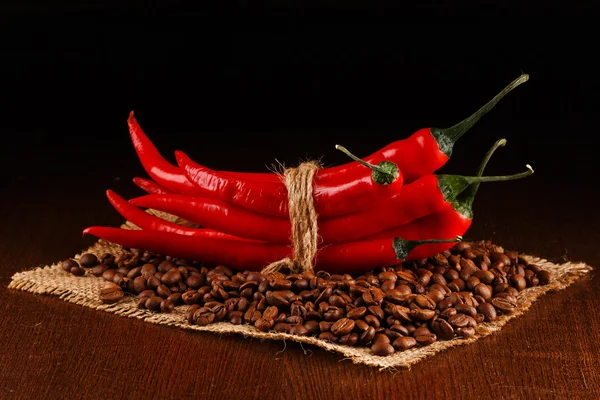 Chili peppers and coffee — Stock Photo, Image
