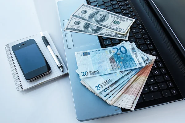 Money and electronic devices — Stock Photo, Image