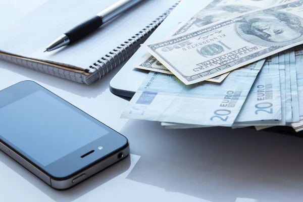 Money and electronic devices — Stock Photo, Image