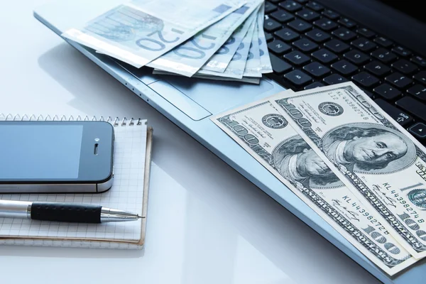 Money and electronic devices — Stock Photo, Image
