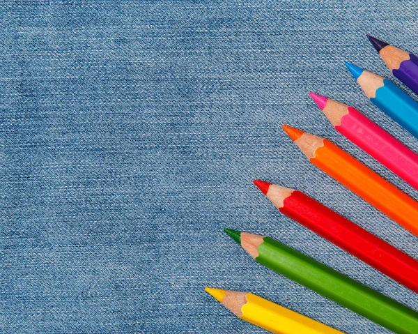 Pensil di atas permukaan jeans — Stok Foto