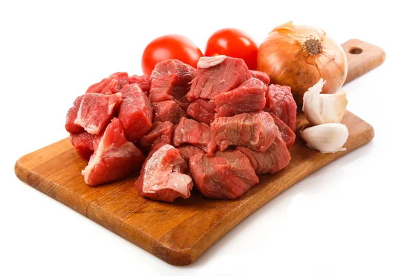 Raw meat on board — Stock Photo, Image