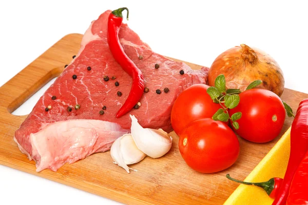 Carne crua e produtos hortícolas — Fotografia de Stock