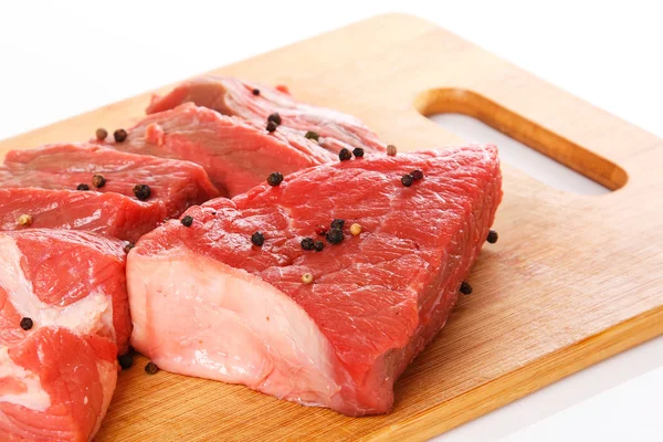 Carne crua e pimenta — Fotografia de Stock