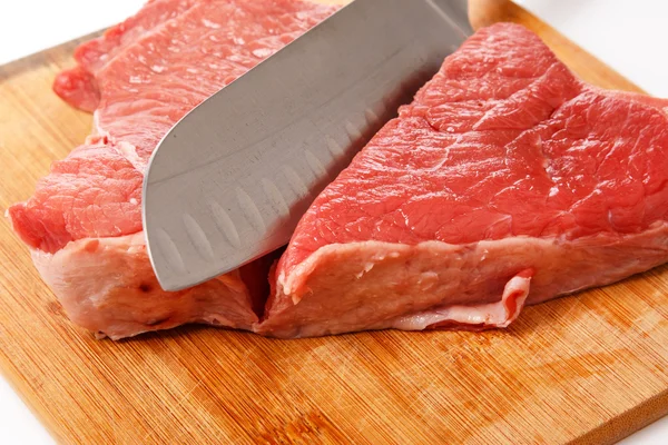 Knife and meat Royalty Free Stock Photos