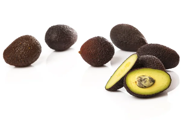 Pile of small avocados — Stock Photo, Image