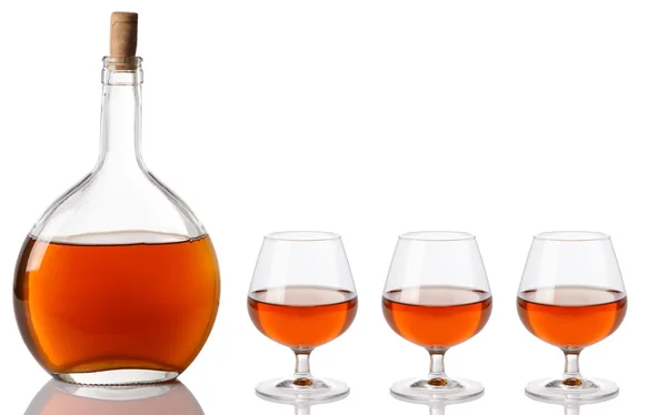 Bottle and glass with cognac — Stock Photo, Image