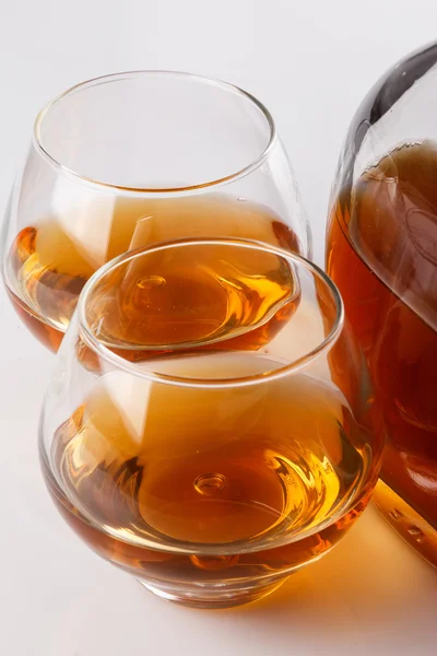 Bottle and glass with cognac — Stock Photo, Image