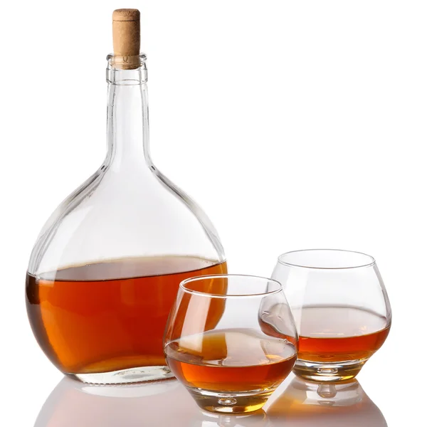 Bottle and glasses with cognac — Stock Photo, Image