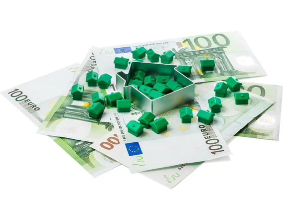 Small toy houses and money — Stock Photo, Image