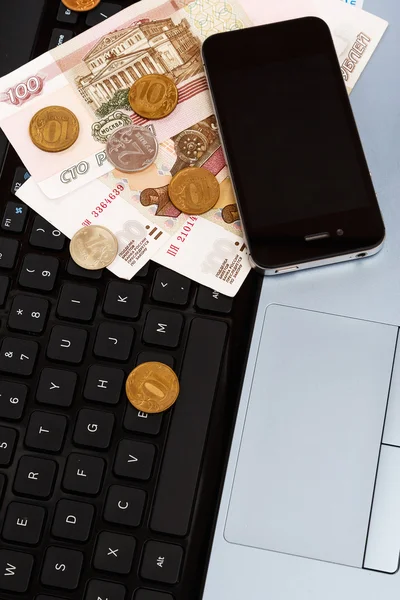 Russian rubles over laptop keyboard — Stock Photo, Image