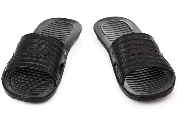 Zwarte flip-flops — Stockfoto