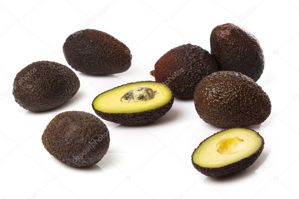 Pile of small avocados