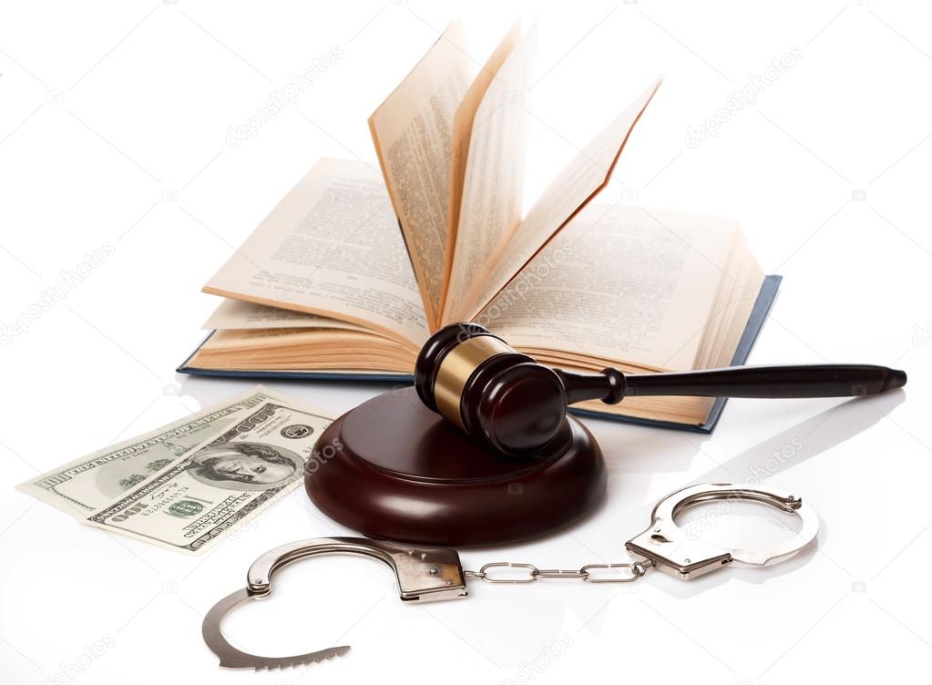 Gavel, books and handcuffs