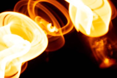 Siyah Arkaplan Hareketi Bulanık Tasarım Elementi Üzerinde Soyut Turuncu Işık İzleri