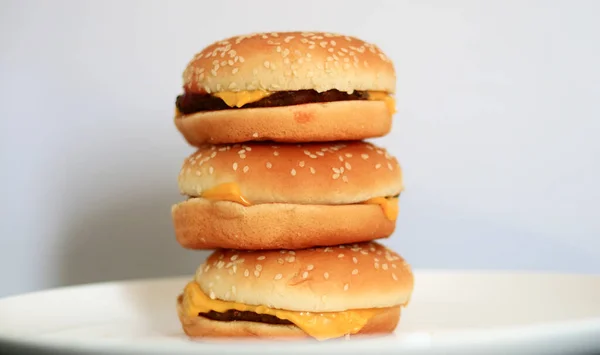 Pile Cheeseburgers White Background — Stock Photo, Image