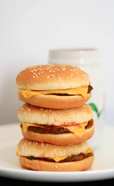 Pile Cheeseburgers Cup Drink White Background — Stock Photo, Image