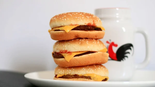 Pile Cheeseburgers Cup Drink White Background — Stock Photo, Image