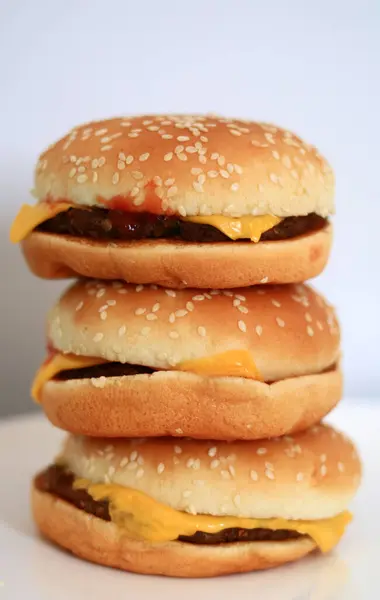 Pile Cheeseburgers White Background — Stock Photo, Image