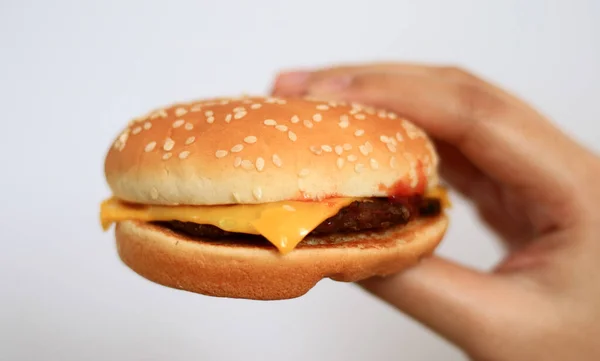 Hand Holding Burger White Background — Stock Photo, Image