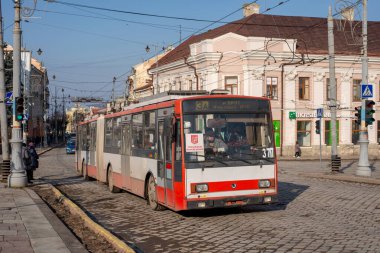 CHERNIVTSI, UKRAINE - March 11, 2021. Trolleybus Skoda 15Tr #377 (ex. Kosice #1018) riding with passengers in the streets of Chernivtsi. 