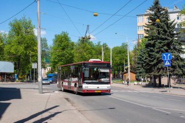 IVANO-FRANKIVSK, UKRAINE - May 09, 2021. Bus Bogdan A701 riding with passengers in the streets of Ivano-Frankivsk.