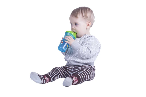Boy and baby bottle — Stock Photo, Image