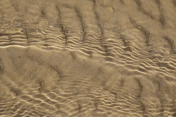 Písek v mělkém moři — Stock fotografie