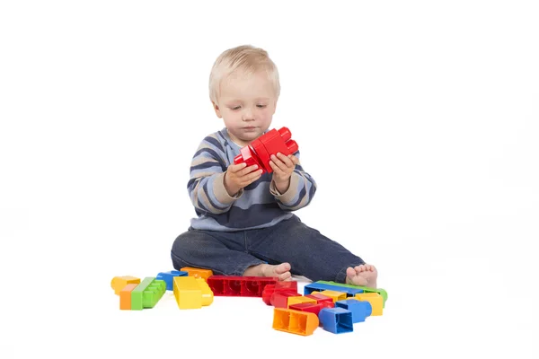 Boy playing with cubes — Stock Photo, Image
