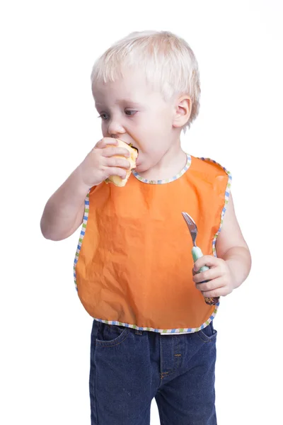 Menino comendo maçã — Fotografia de Stock